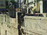 Ronda: The bridge is still quite amazing, especially when watching workers hanging over the side restoring it.