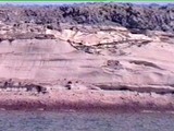 Tenerife: On the way back to port we take in some of the cliffs that make up the coast on that part of the island. Any beaches on the island are made from sand imported from the Sahara Desert.